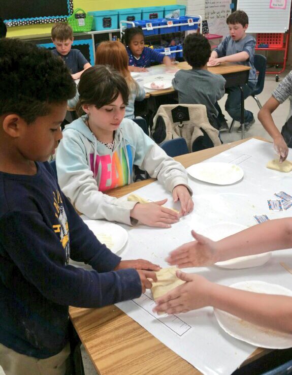 MrsBrond's tweet photo. Teamwork makes play dough! Measuring ingredients, dividing equally between friends, and creating and naming shapes. Getting ready for our last Unit of the year! #futurefourthgraders https://t.co/A6Ykq7w9fX