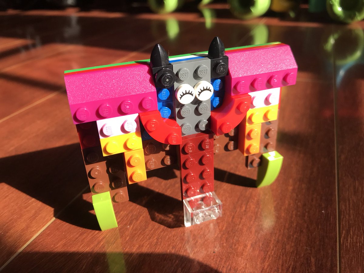 danortizmd's tweet image. A little bit of #LEGO #symmetry. I’m not quite sure what I made with my son, but it sure does look happy basking in the sunlight. #SaturdaySun