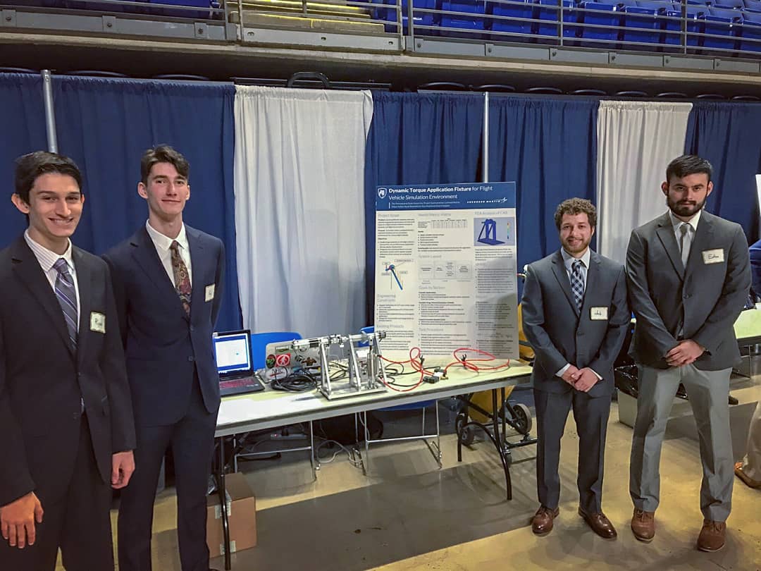 relativeread's tweet photo. The Penn State Engineering Design Showcase. We designed and machined a test fixture that applies variable torque, simulating wind resistance to increase @LockheedMartin's flight vehicle accuracy #psuengineering https://t.co/3DymXwjJfJ