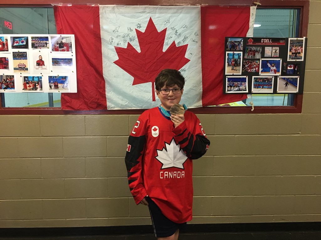 staj240's tweet photo. So good to catch up with Norm today @westendhockey end of year picnic! And what a privilege for my son to wear @3ricODell Olympic bronze medal! #weknewyouwhen #westendhockey #ottawa #futurehockeyplayer https://t.co/tbxnvLj50q