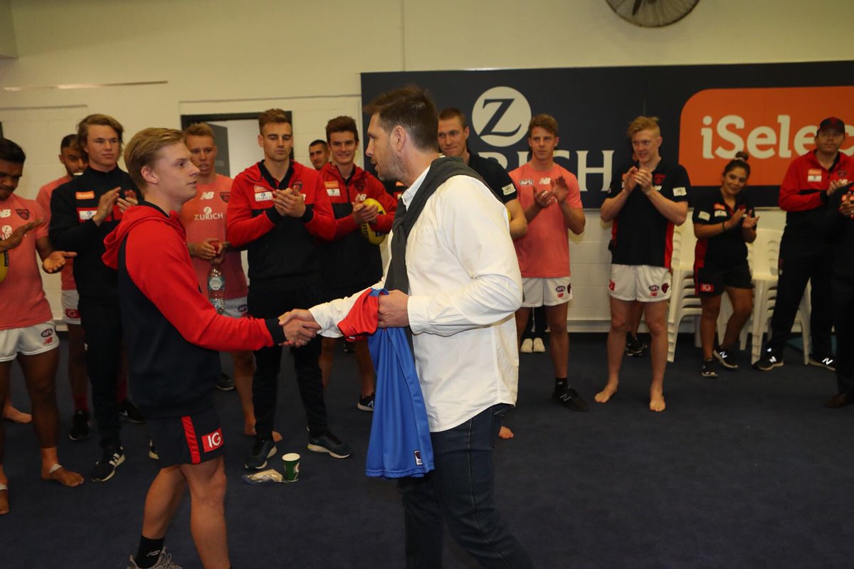 melbournefc's tweet photo. A special moment for Charlie Spargo. 🌟

His Dad Paul presenting the red + blue jumper, as Charlie becomes a fourth generation VFL/AFL player. 

Go well, Charlie! #RaiseHell #AFLDonsDees https://t.co/Q9LkzMiCyS