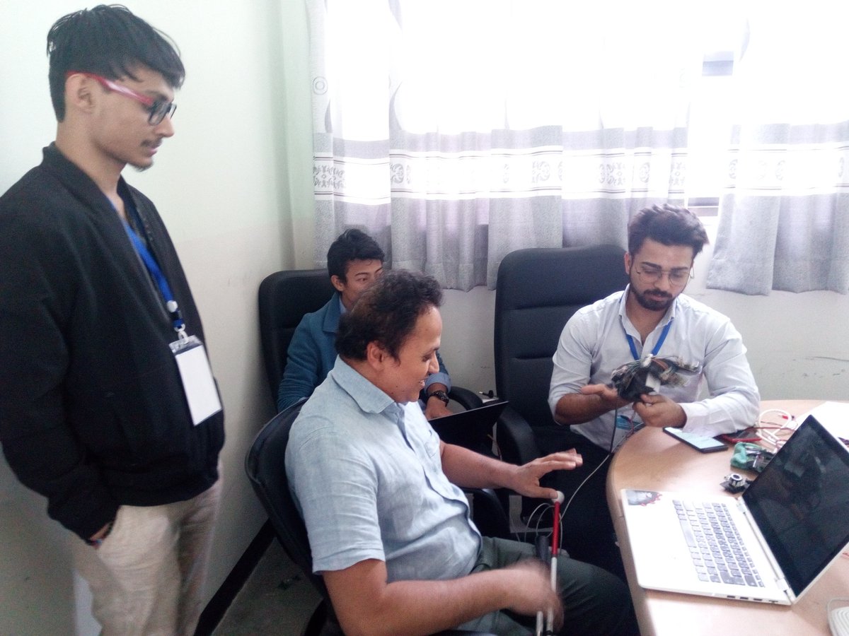 Lalee_Boo's tweet photo. @dineshkaushal interacting with hackathon participants #NPtech4PWD @LIRNEasia @isocnepal @merobabu https://t.co/NCa9WRIGzJ