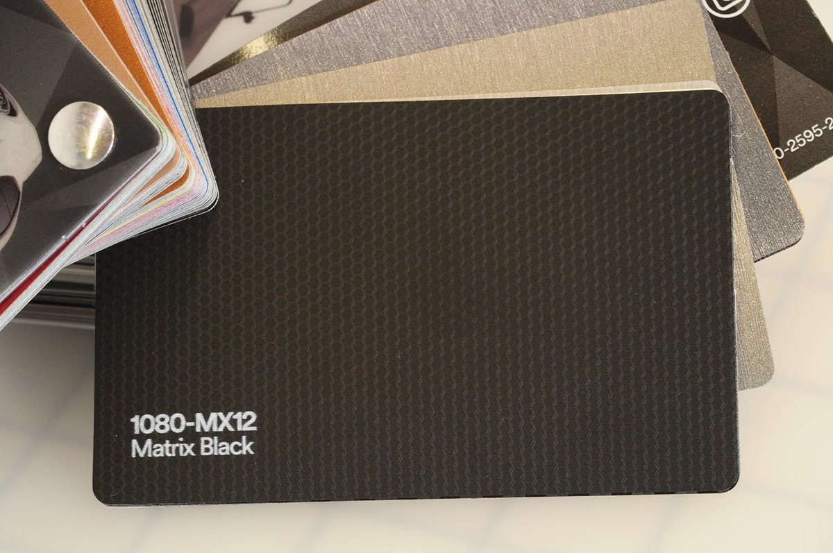 fastlanetintsaz's tweet photo. New swatch book time - here is Matrix Black, a lightly textured vinyl for stripes, hood / roof wraps, decals, or even full wraps. Will make the car or truck look even less reflective I think than the regular matte black. https://t.co/zgoOzGs0MG