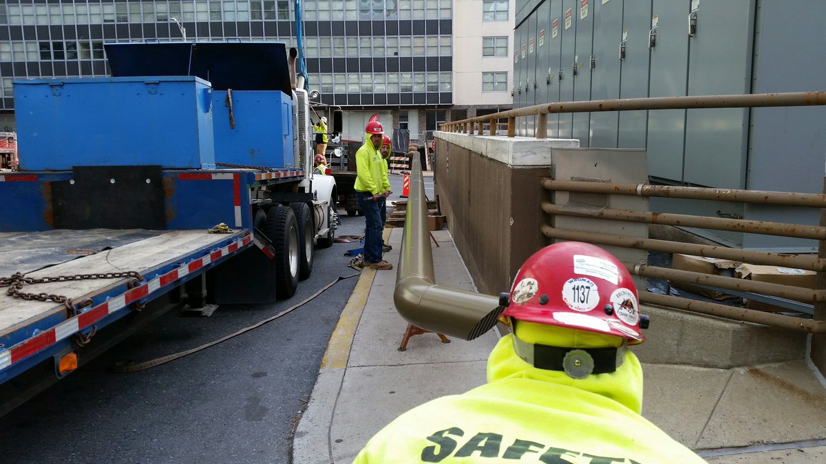 JamesCRAFTSon's tweet photo. These exhaust pipe extensions (connected to a large diesel generator) were pre-fabricated in our shop, transported to the site, welded together on the ground, then lifted into place by a crane. https://t.co/8YBLZVchph