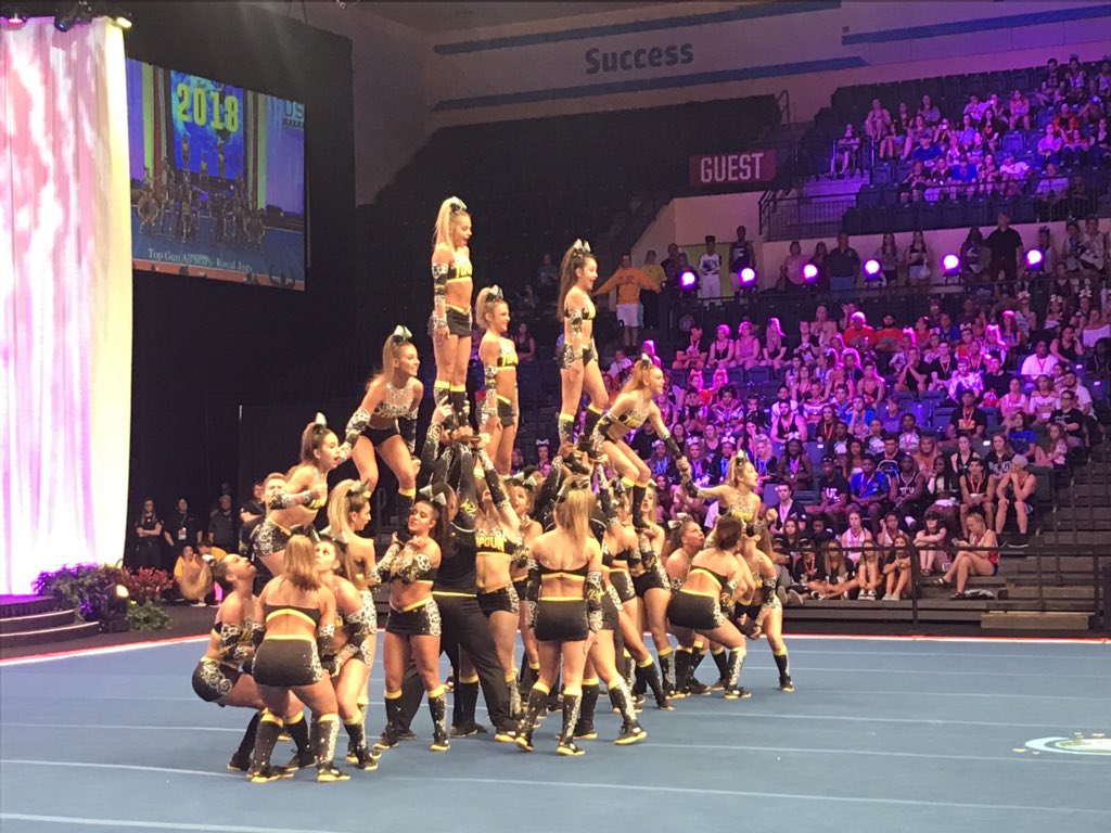 CheerTheory's tweet photo. TG Royal Jags just DELIVERED a beautiful routine! 💛😻 #FieldHouse #Worlds2018 https://t.co/6ldx8mqXtC