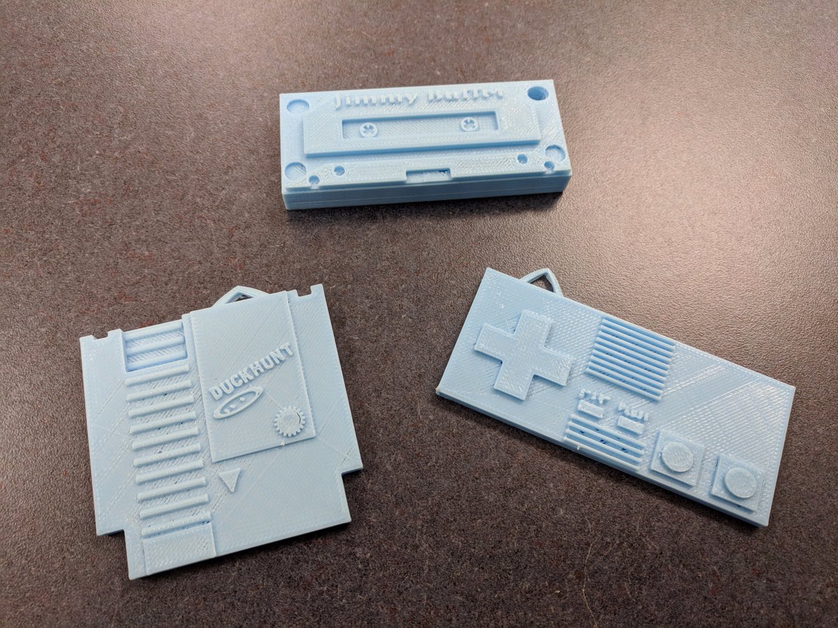 MrGreenUMS's tweet photo. Wait, what year is it? These awesome 3D printed designs were created by students, I was shocked they even knew what they were! #weareUMS #fcpsCTE #80sbaby https://t.co/Sy1QPxcZlh