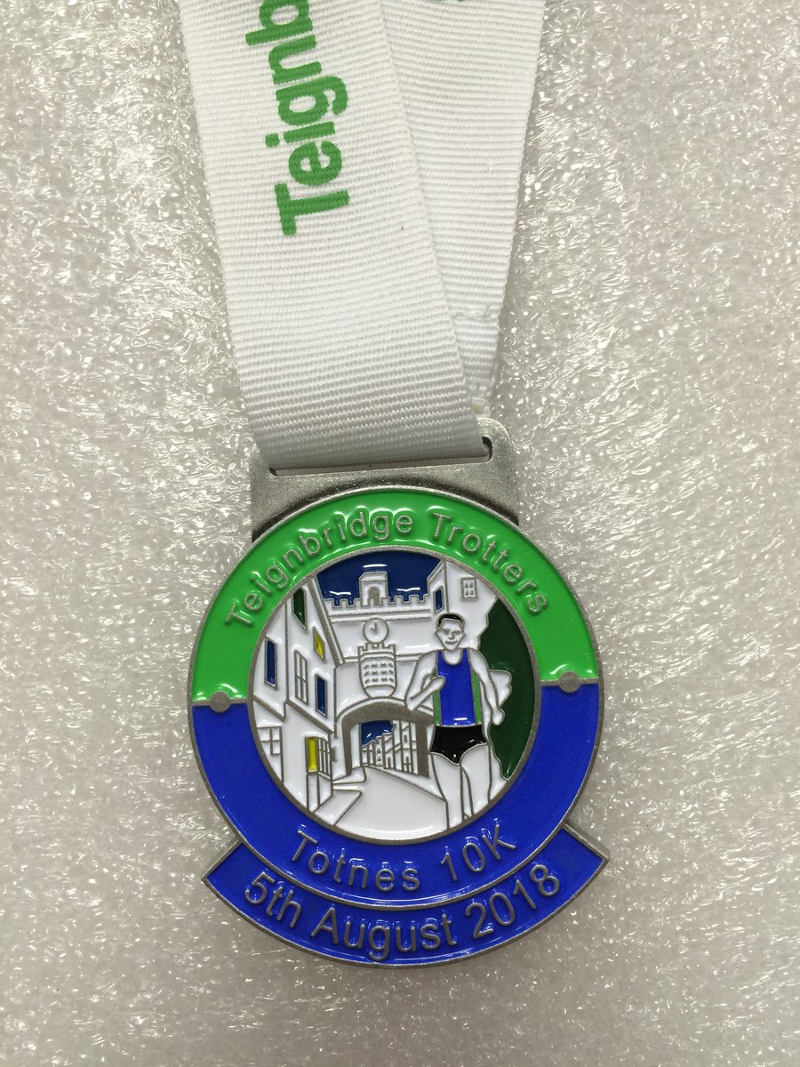 TheMedalistUK's tweet photo. Entries open for the Totnes 10k on the 5th August. This sell out race organised by Teignbridge Trotters has awesome medals. We know because we made them 😂😁 #medals #runnersbling #racebling https://t.co/le17oQDeJp