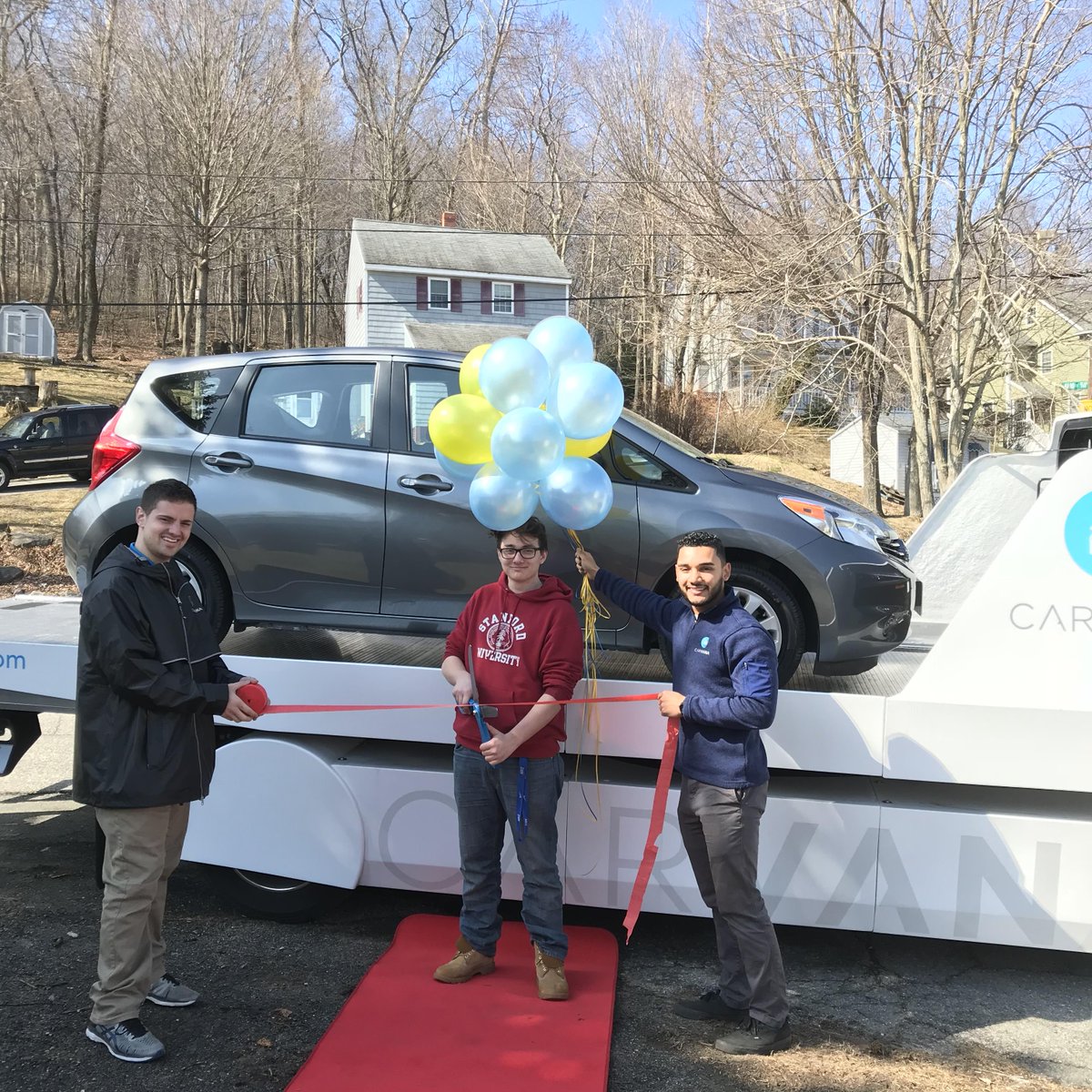 Carvana's tweet image. Welcome to #Beantown! Congratulations to our first customer out of Boston, Jayden! We hope that you love your #2016NissanVersaNote! #ThatDidntSuck #TheNewWayToBuyACar #DontPlayTheGame