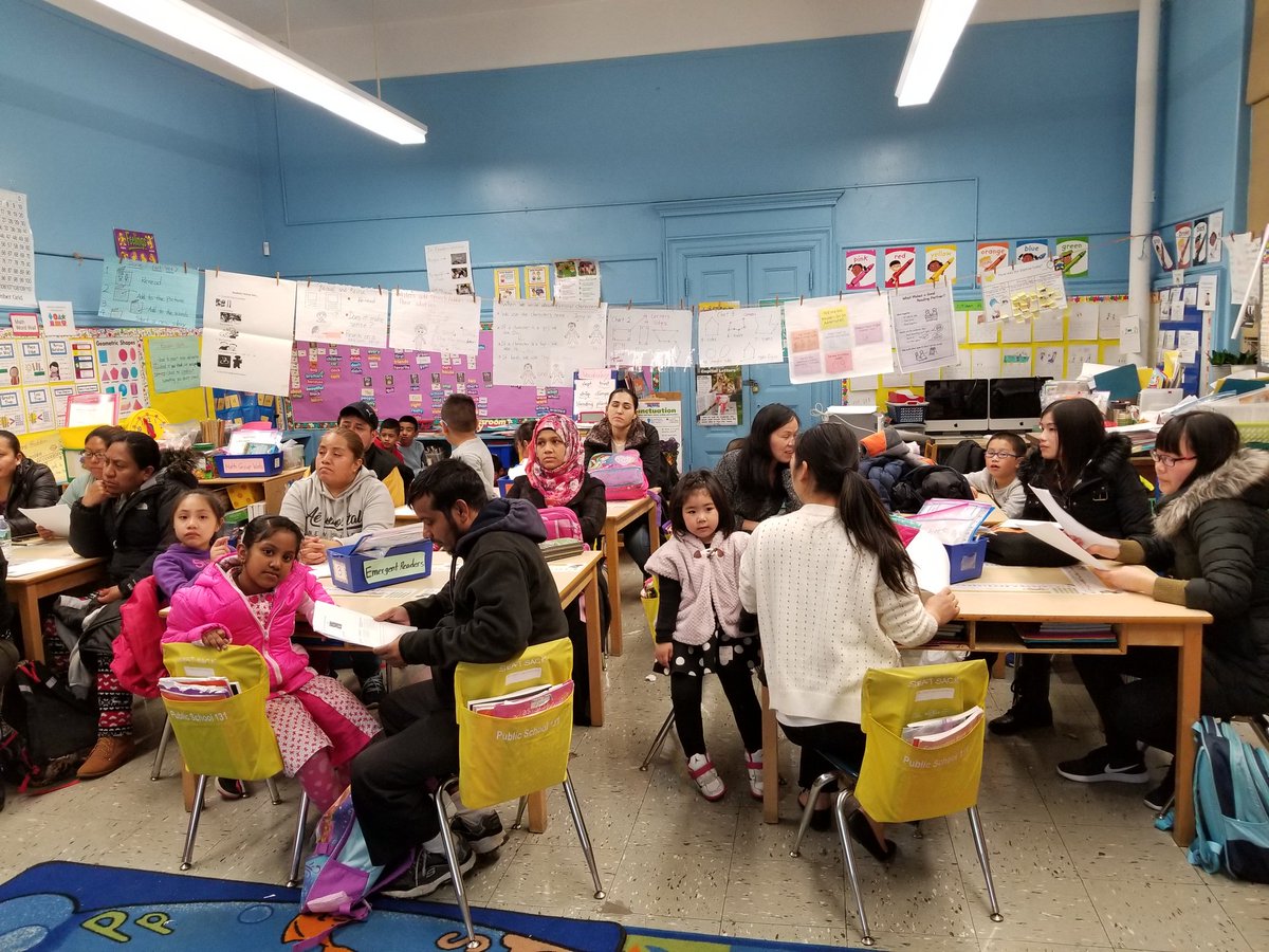YinLiang8's tweet photo. Class: 1_205 &amp;1_206 were having a NYSESLAT workshop for parents. https://t.co/fBtoWREWi4