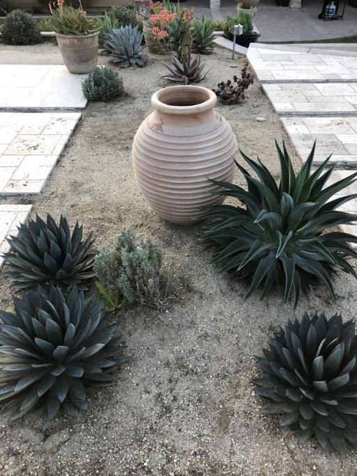 EyeoftheDay's tweet photo. Thank you for choosing Eye of the Day and sharing your beautiful garden with us @jerandoc! We always love to see the home our pots end up in remember to tag us at #EOTDFinds. https://t.co/1UC7RfpzRR