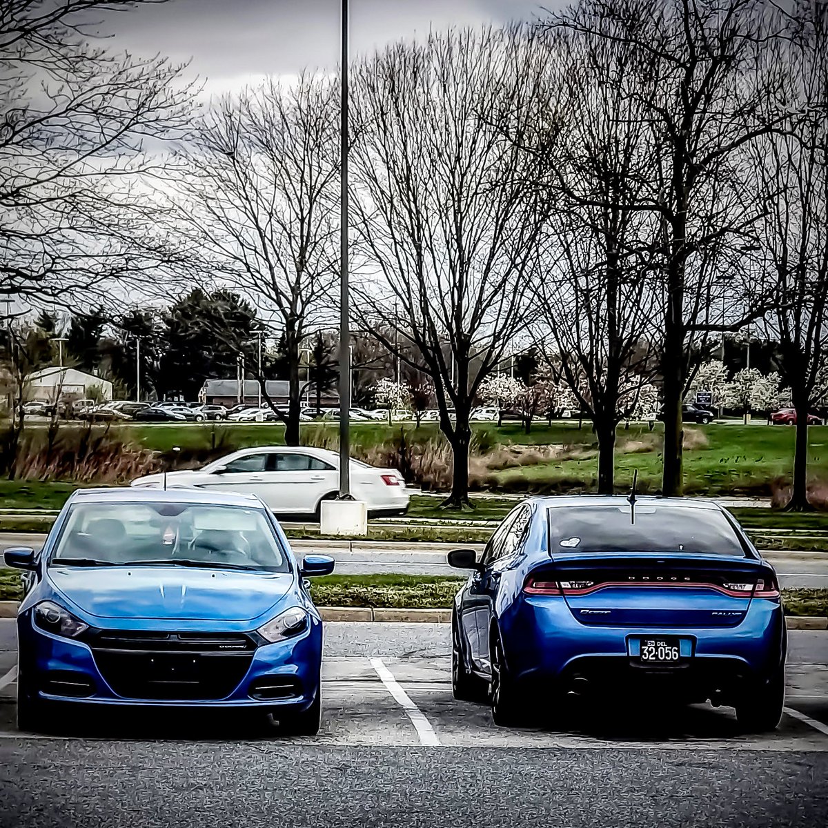 MpVapez's tweet photo. I happen to look outside at work and what do I see? My car twin lol I'm on the left. Not often this happens lol. 

#dodge #dodgedart #mopar https://t.co/mEpDHeNrPb
