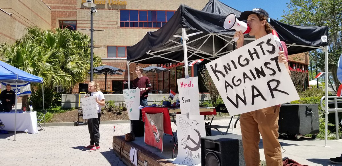 CFFocus_'s tweet photo. .@ucf_socialism protests U.S. airstrikes in #Syria
https://t.co/gxEpHYoxFE https://t.co/LKfa5aHq10