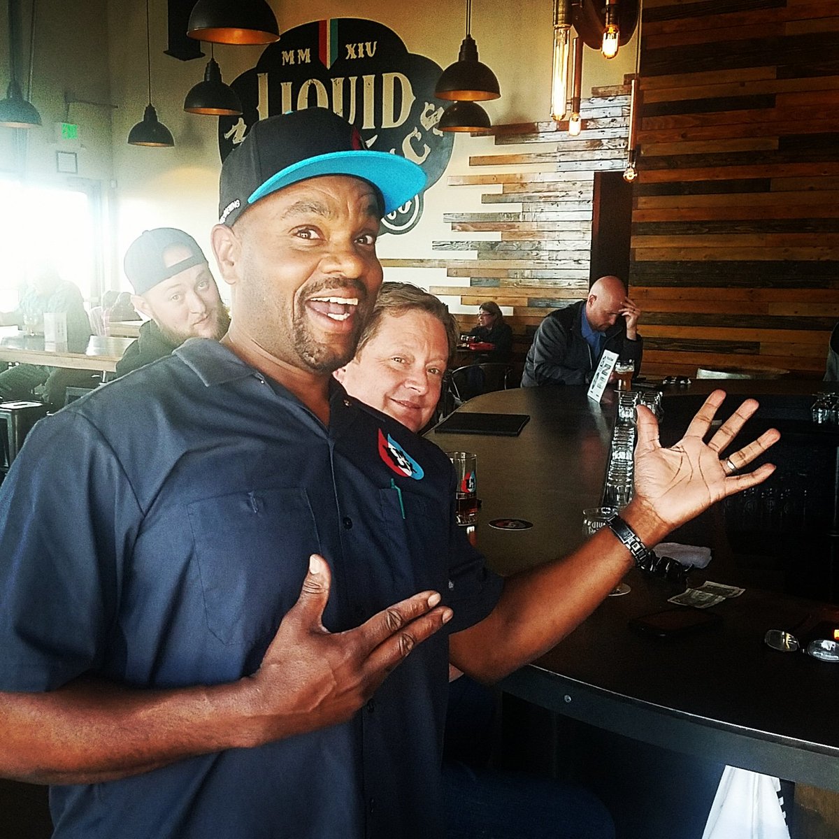 Liquid_Mechanic's tweet photo. Liquid Mechanics community, meet the newest member of the family.  Derek has joined our incredible distribution crew.  Give him a high five when you see him out and about. #welcometothefamily #photobombers #employeenumber11 https://t.co/WjXuBO2Jf6