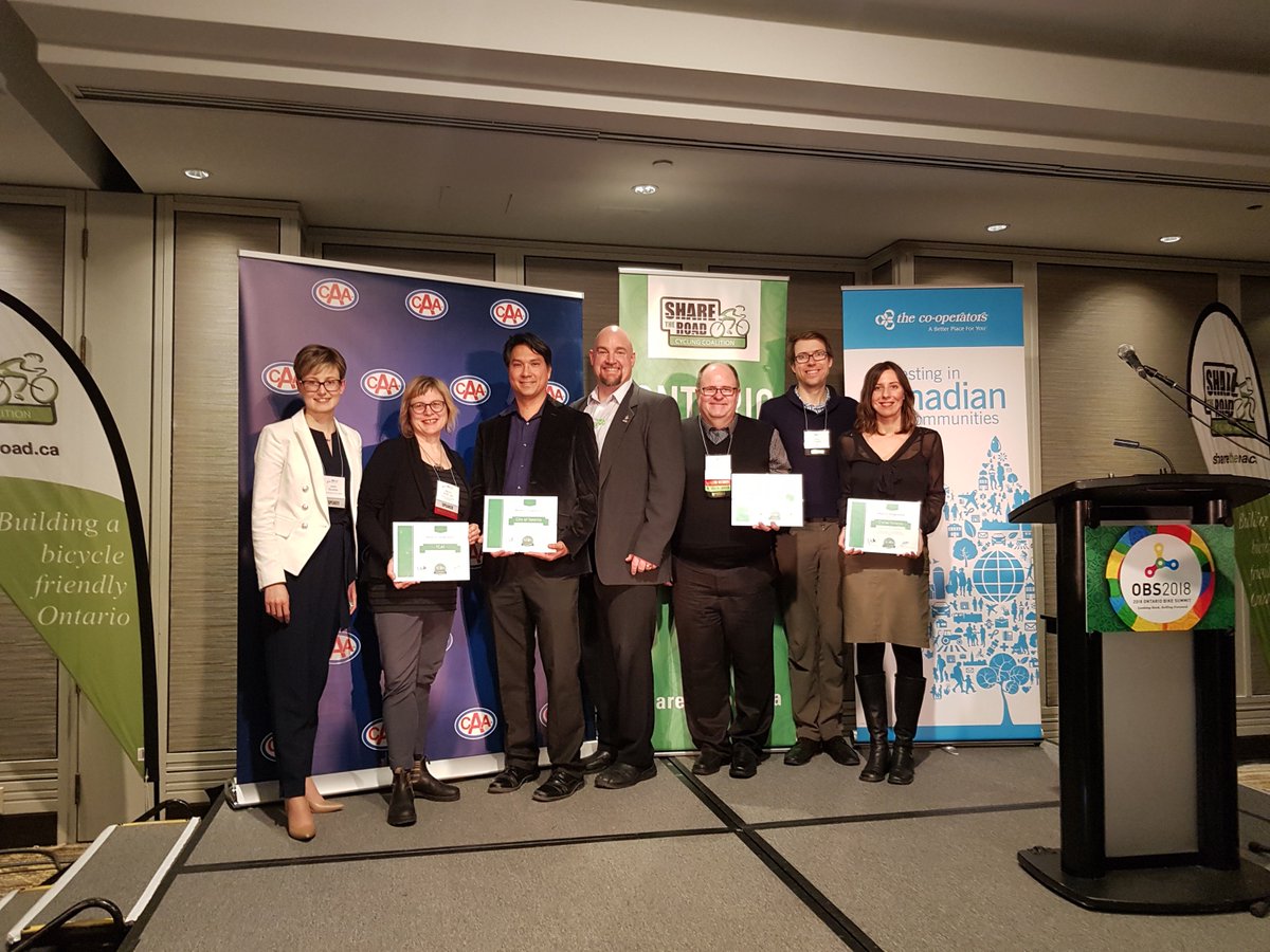 CycleToronto's tweet image. Honoured to receive the Community Collaboration #WheelsofChange award from @STRCycling alongside @TCATonline @TO_Cycling @MMMGroupLimited @Jason_Neudorf @BellsOnBloor @AlbertKoehl. Thanks @katie_wittmann for the photo! #OBS18 #BikeTO #BloorBikeLanes
