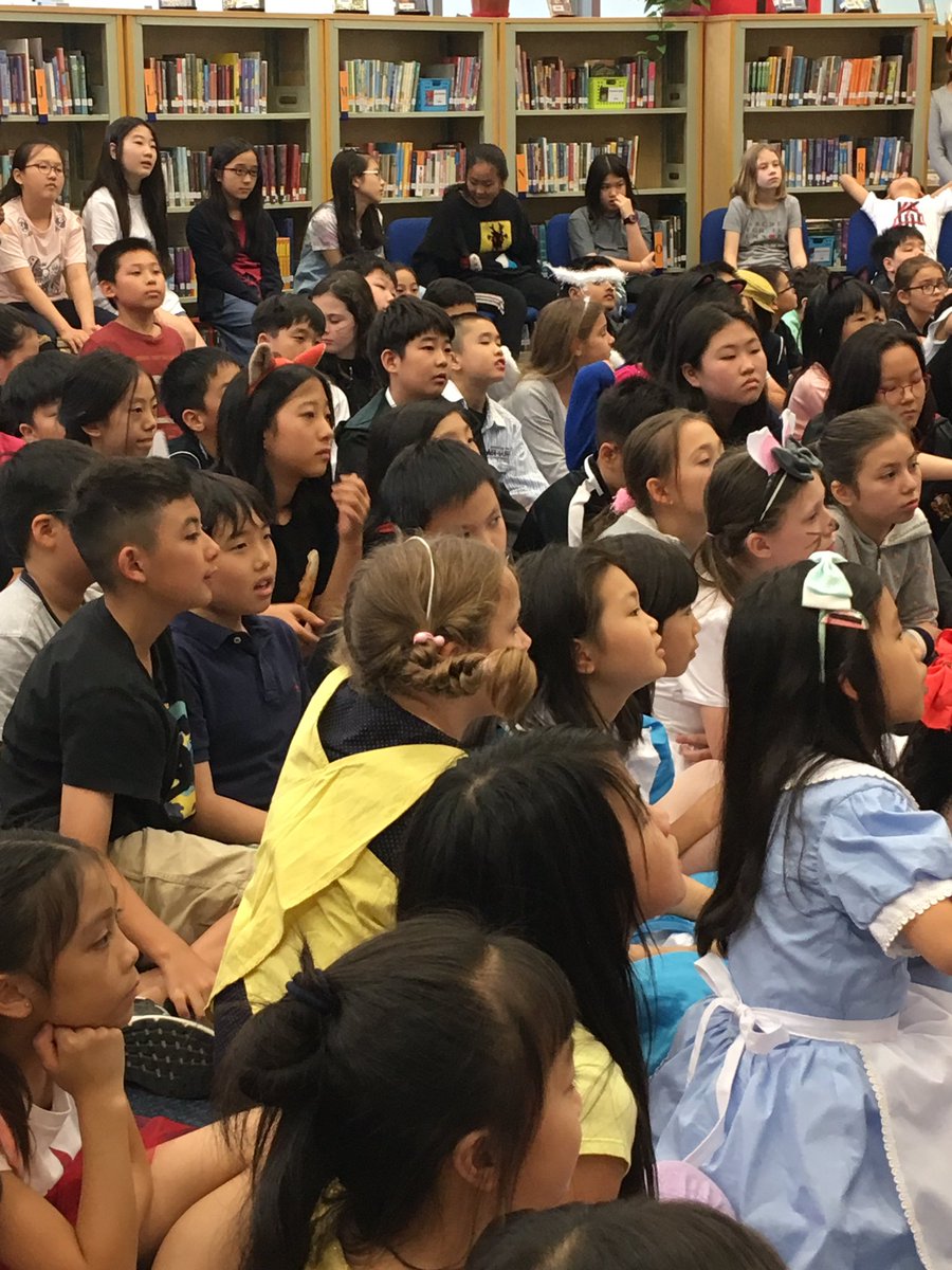 keteaches's tweet photo. Literacy week at #aisgz with visiting author @helainebecker . Activities include dress like a book character and book cover door scavenger hunt. #literacy https://t.co/YrZS7kMNl4