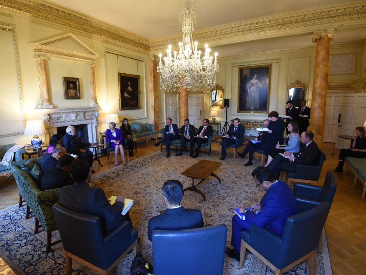 narendramodi's tweet photo. Wonderful meeting with Prime Minister @theresa_may at 10, Downing Street. We had fruitful discussions on multiple aspects of India-UK relations. @10DowningStreet https://t.co/Xugz1PwwQ3