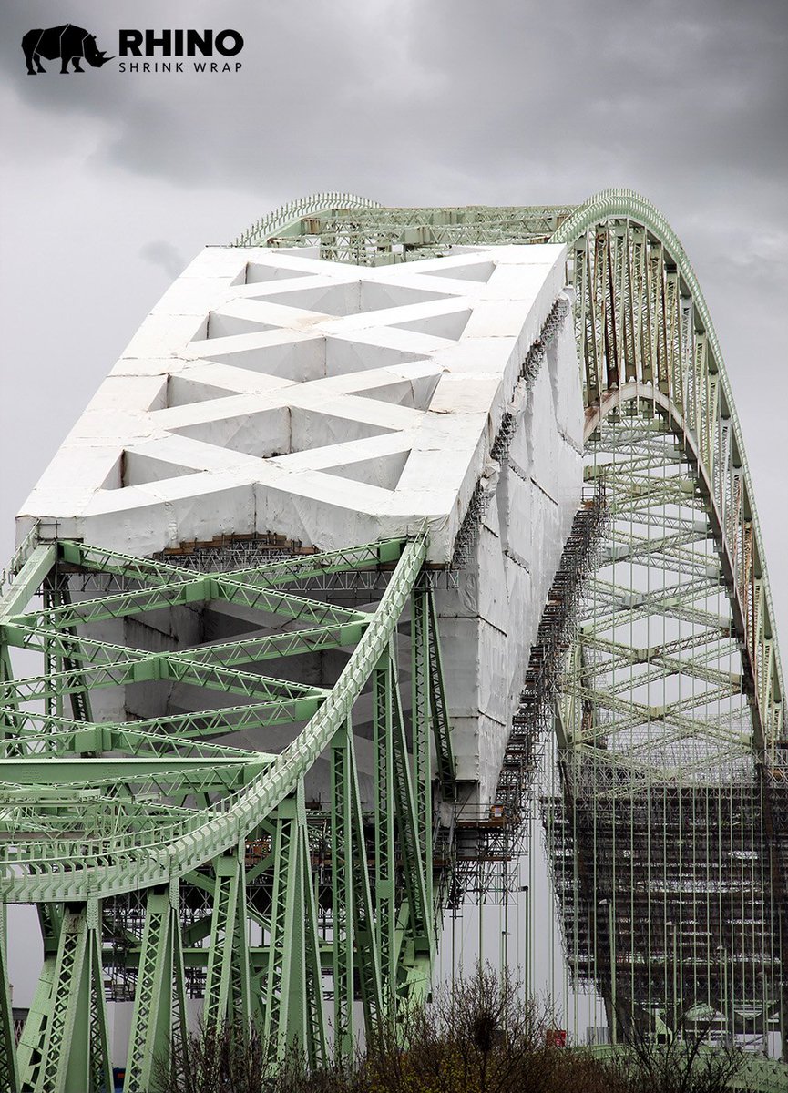 rhinoshrinkwrap's tweet photo. The 1st phase of encapsulating the Runcorn Silver Jubilee Bridge is now complete. The complexity of the structure and the exposure to severe weather conditions made this a challenging project - The blasting and painting of this key transportation route can now commence. https://t.co/PW0lDovguA