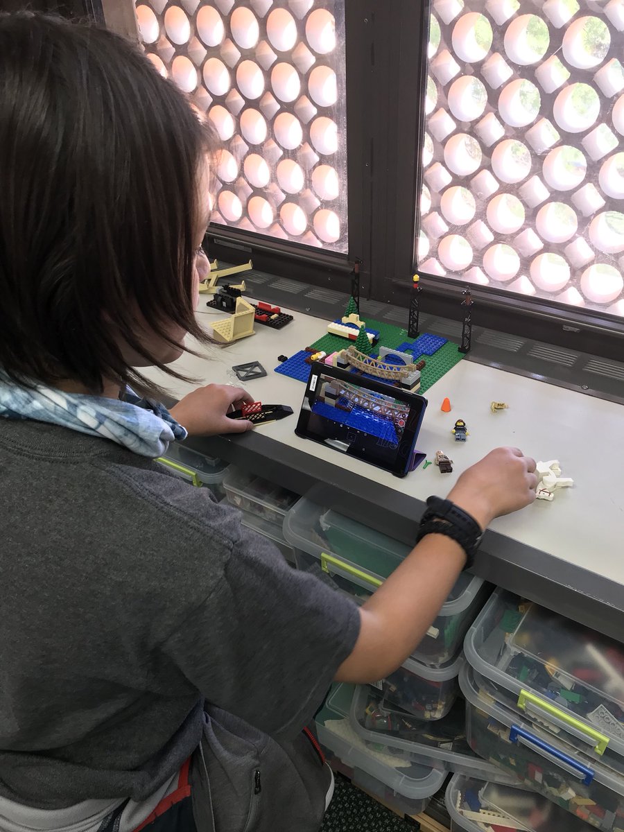 GivensLibrary's tweet photo. What do you do when your website is finished? Help Ms. Olsen develop library stations for next year. One student is testing movie making apps while more are trying out possibilities with Makey Makey. #scslmc https://t.co/WXgkVM3i54