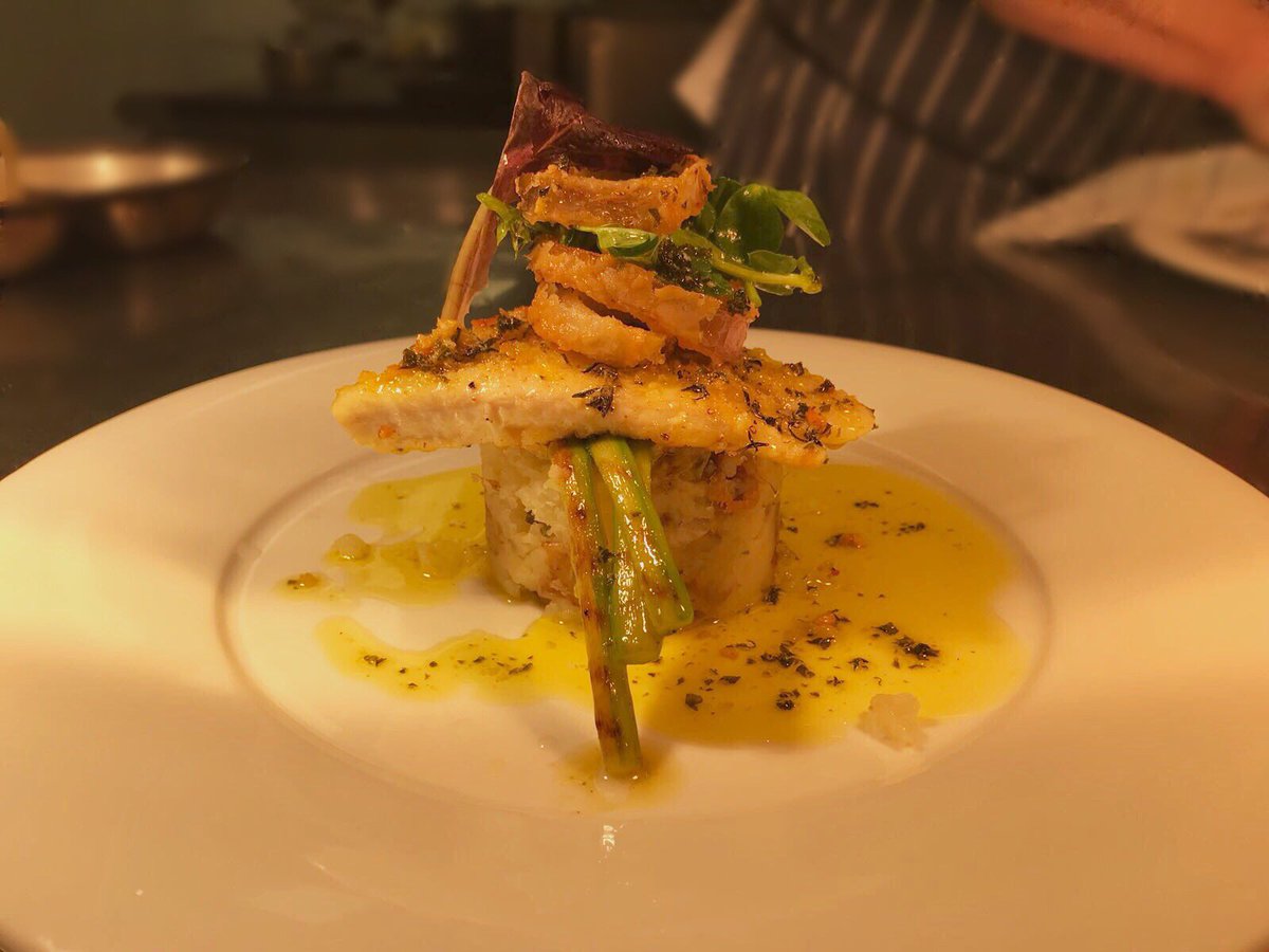 ⁠⁠⁠⁠⁠⁠⁠⁠⁠⁠⁠⁠⁠⁠Dish of the week: Herb and citrus crusted halibut with champ potatoes and grilled asparagus! Brand new for our Summer A La Carte 🍲