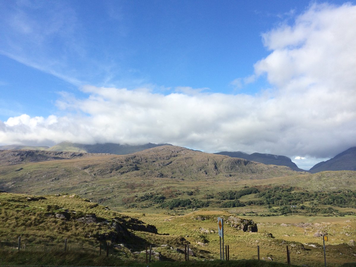 FocusPhotoCo's tweet photo. At the edge of the property on the Fairy Trail, the #Carrauntoohill Eco Farm in #Killarney, #Ireland presses up beautifully against the mountains. #travel #wanderlust #FocusPhotoCo https://t.co/0lzFpEk875