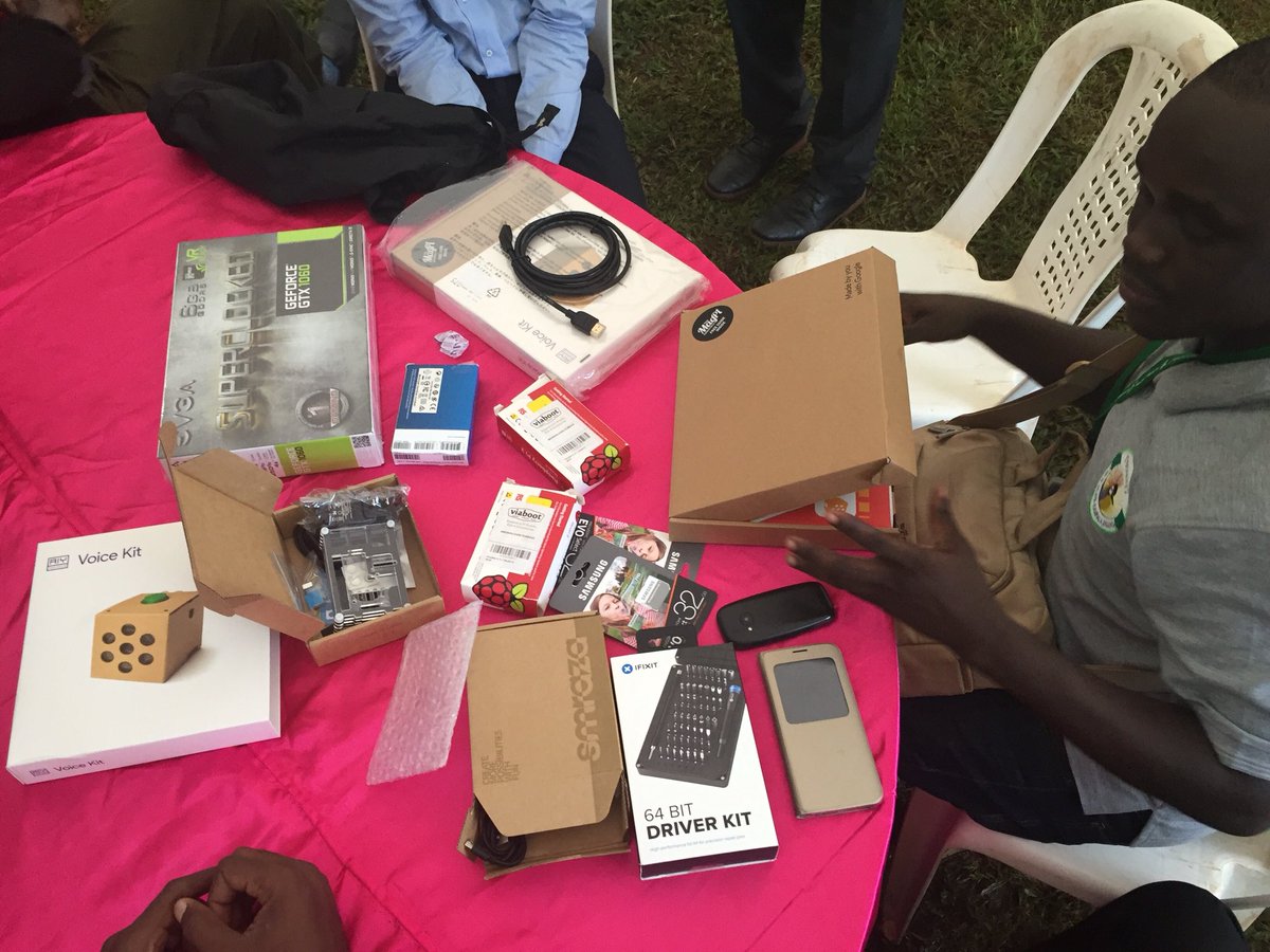 InSTEDD's tweet image. Going through the tech haul delivered to the #Makerere AI Research Group in honor of our first event together #ChatbotForGood @Raspberry_Pi @edjez