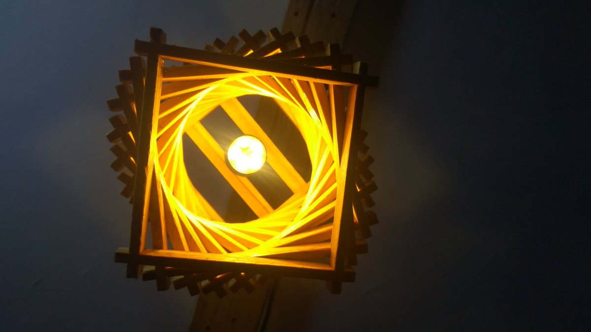Abstractart16's tweet image. Wood spiral pendant light @500 each