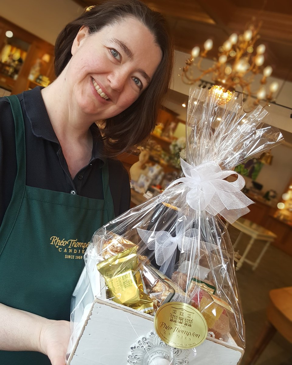 RheoThompson's tweet photo. The wonderful Barbara took a moment to model our new black and white music line in celebration of the @KiwanisFPAStrat! Isn't she rocking her Vanna White moment? #gobarb #candystore #music #feelthemusic #rheothompsoncandies #dtstratford https://t.co/w7cvnvgjEe