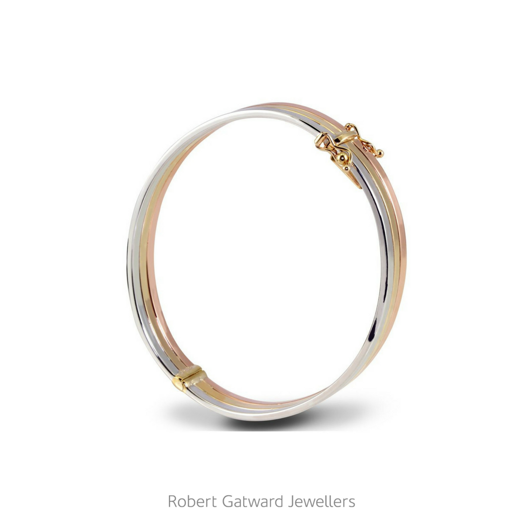 Robert_Gatward's tweet image. Combining three strands of precious metal, this unique bangle blends together exquisite white gold, classic yellow gold and alluring rose gold: bit.ly/2H6X42W 🌸 #SS2018 #SpringEdit #RobertGatwardJewellers