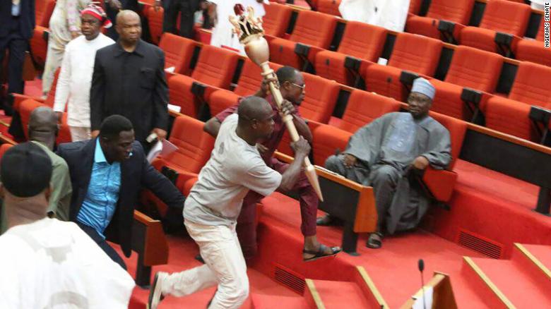 CNN's tweet photo. The Nigerian Senate was on high alert after armed men interrupted a session at Nigeria's parliament, stealing its mace https://t.co/h3BF2WWnRh https://t.co/CK2gVpjAWE