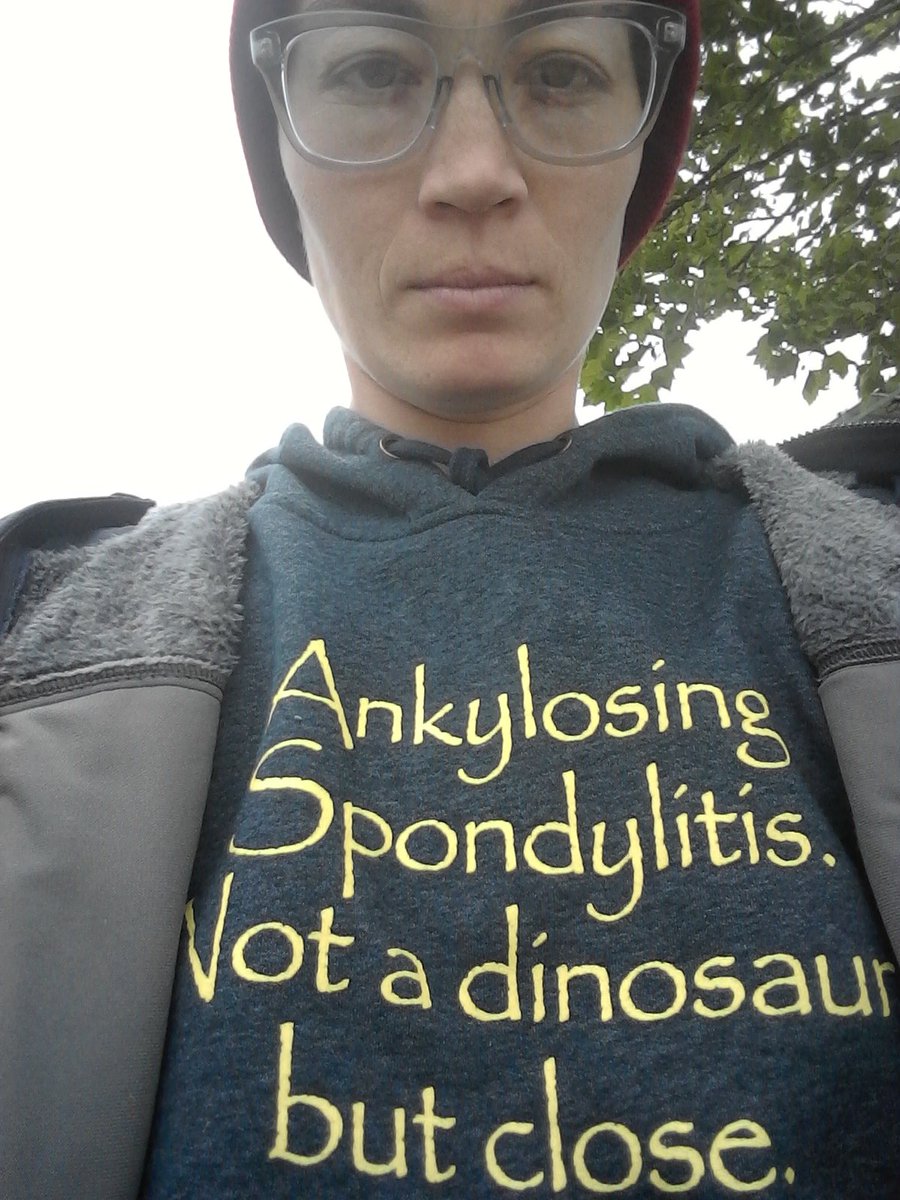 BeingCharisBlog's tweet photo. The fatigue is strong with this one.

[Image: light-skinned person looking at camera, wearing sweatshirt that says "Ankylosing Spondylitis. Not a dinosaur, but close."]

#spotspondy #spondywhat #thinkspondy #chroniclife https://t.co/YrmGA0umF8