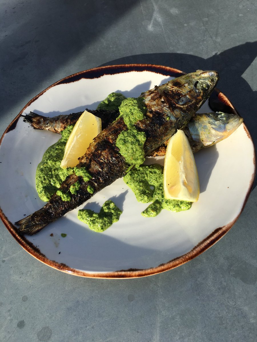 Sardinas a la Feria straight off the barbecue, served with zhug, our fabulous spicy sauce!