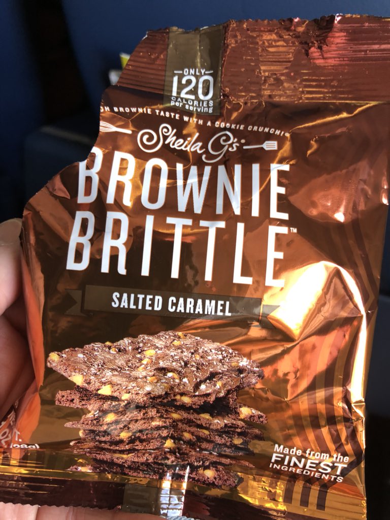 EricLevyTV's tweet photo. Enjoying Sheila G’s @BrownieBrittle at about 30,000 feet up. When I say enjoying, I mean it. In my own opinion, this stuff is GOOD!! First time and not the last time having it. #BrownieBrittle #SheilaG #DeltaAirlines #DeltaFirstClass https://t.co/r17ma5kTls