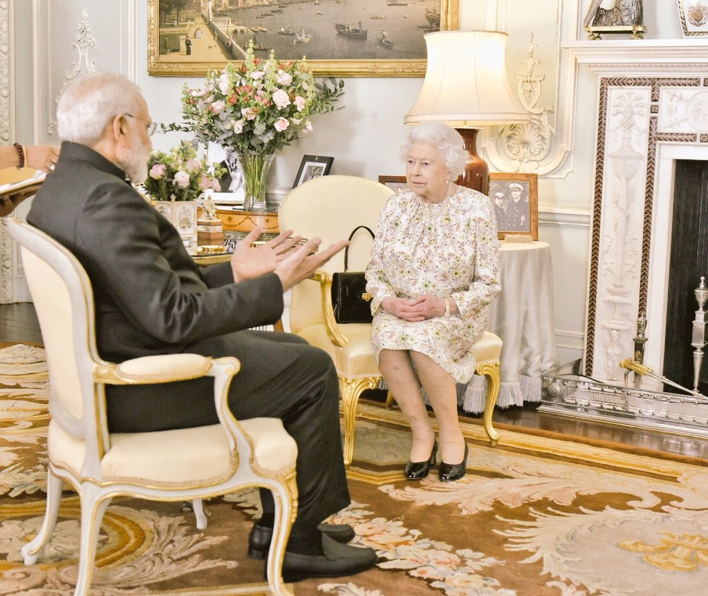 MEAIndia's tweet photo. PM @narendramodi had an audience with Her Majesty the Queen at Buckingham Palace. https://t.co/GDkjJQWmFj