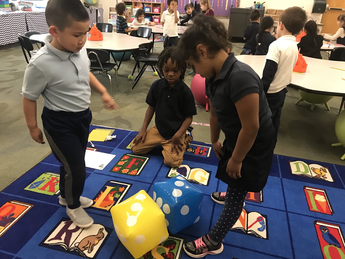 BoonesKinders's tweet photo. We’re using the inflatable dice from #target to practice addition and subtraction problems during #math station rotations. @kcpublicschools @KCPS_Trailwoods https://t.co/FSuOLwIaPG