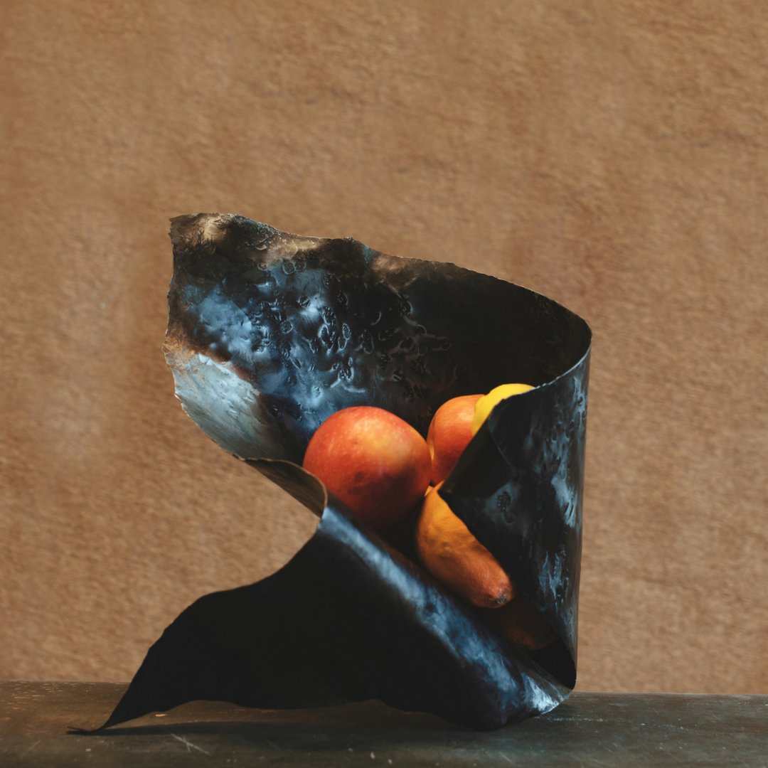OHolmanDesign's tweet photo. Finished shot of my Lily bowl #ollieholmandesign @craftdesignmagazine 
#steelbowl #decorativevessel #steelvessel #contemporaryvessel #artisanlife  #artisanhome #metalworker #metalartist #sculpturalvessel  #homedecor #handemade https://t.co/4wCbVP0mLN