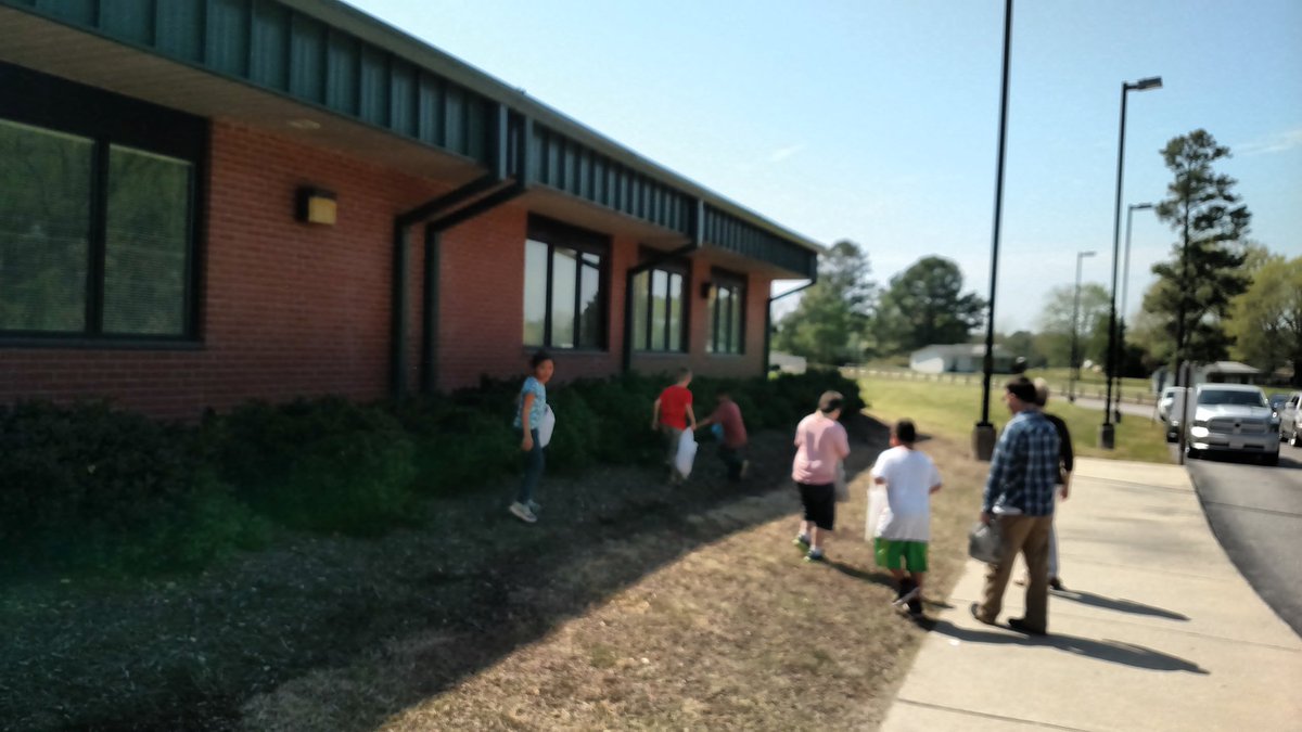Doing our part to keep our school beautiful, save the Polar Bears and honor Earth Day.