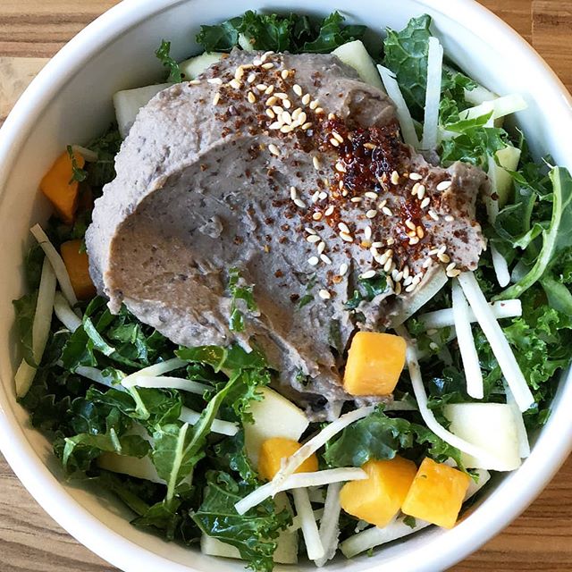 Veggies and spice and everything nice. #Yumami Black Bean Savory Dip, with its yuzu citrus notes and togarashi spice, makes a perfect salad booster. 🌿🌿🍋🌶️