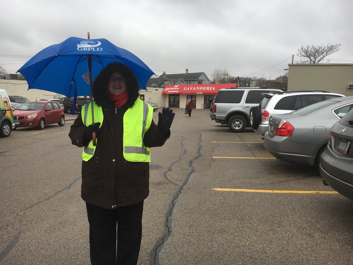 EPELPartnership's tweet photo. When Gail Borden’s Director of Youth Services and EPEL’s board member stands in the rain to direct traffic. Jennifer Bueche you are amazing! @gailbrdnlibrary #LanguageintheLaundromat https://t.co/1RdlA84MOn