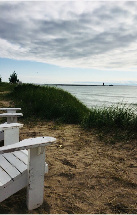 2_the_ncbeach's tweet photo. Wishing I was sitting in that Adirondack chair enjoying that view. #ThoseSummerDays #SheboyganWisconsin #LakeMichigan #BlueHarborResort https://t.co/f40xPY3GA9