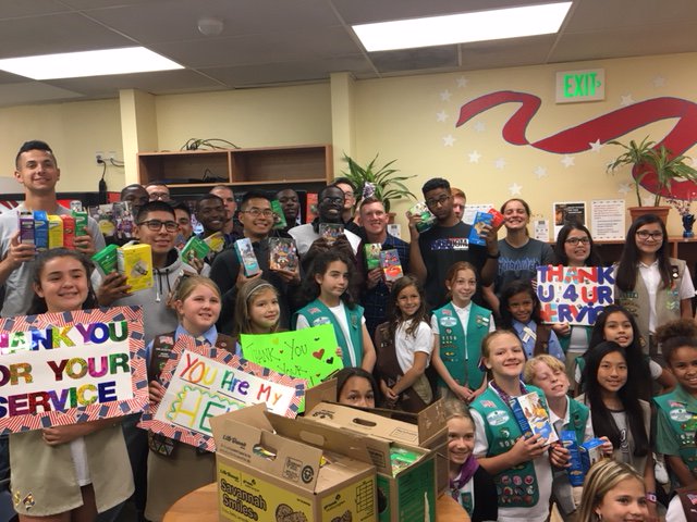 flyLAXairport's tweet photo. Military members received a tasty surprise at @BobHopeUSO thanks to @GirlScoutsLA. The girls and service members enjoyed cookies and sung songs together. It was an awesome way to show the military how much their service is appreciated. #LAX #operationcookiedrop #military https://t.co/vpNX1HOKhv