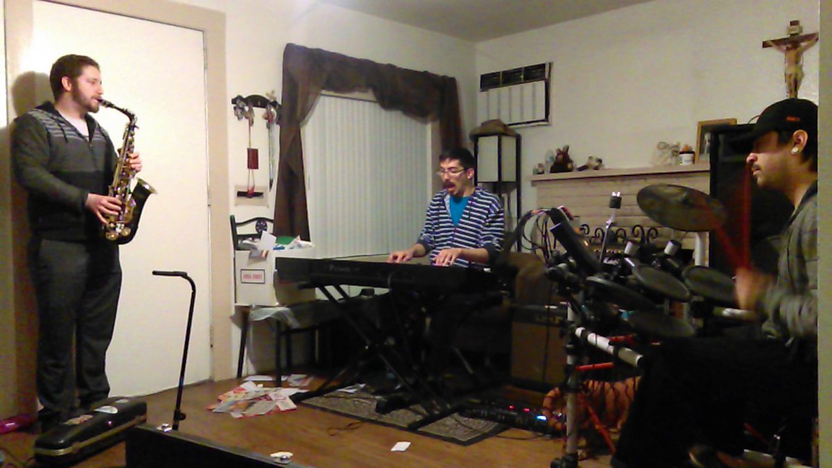 Chance on Saxophone, Nelson on keyboards, Jp on a back-up drumset.