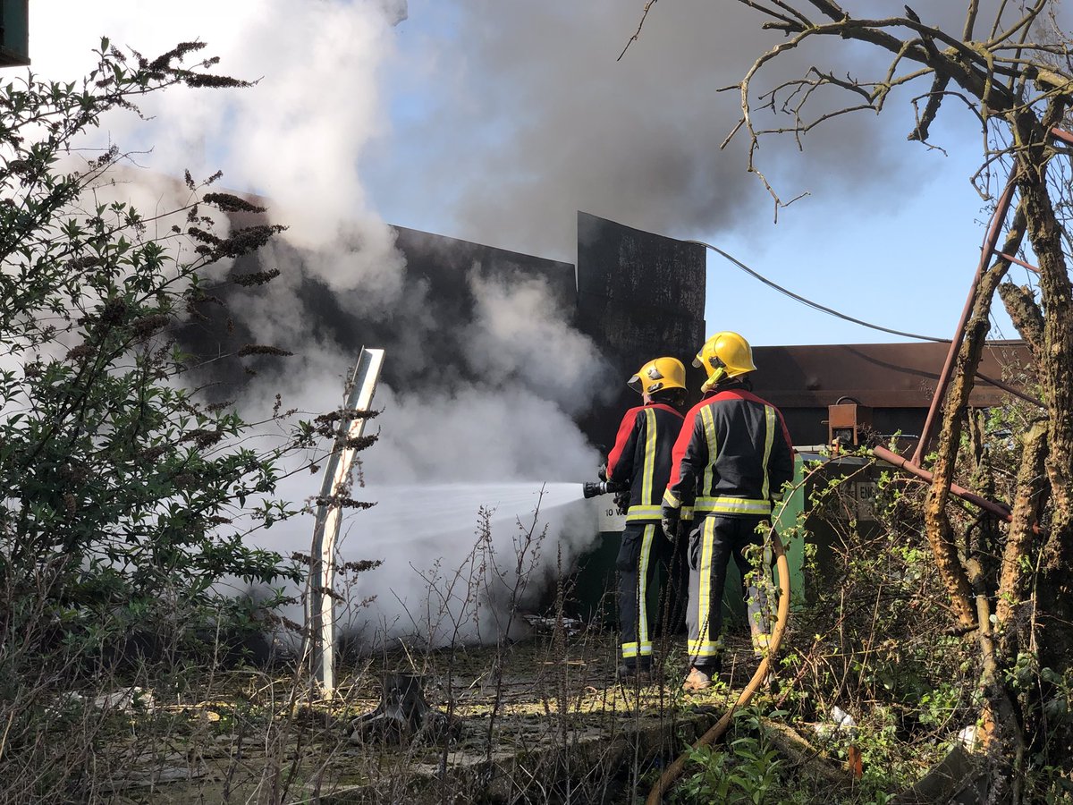 WMFSSheldon's tweet photo. Scrap yard fire. Sheldon and @FoleshillFire tasked with keeping tanks of hydraulic oil cool. https://t.co/oMF5BCskEk