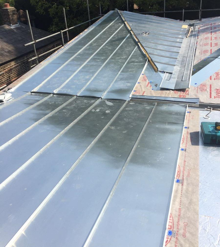 At Claremont Road we installed approx. 150m2 of traditional standing seam panels to a warm roof build up. This involves using a system called Warmfast, in which special pegs, screws and cleats are used. This system allows zinc to be installed straight onto the insulation