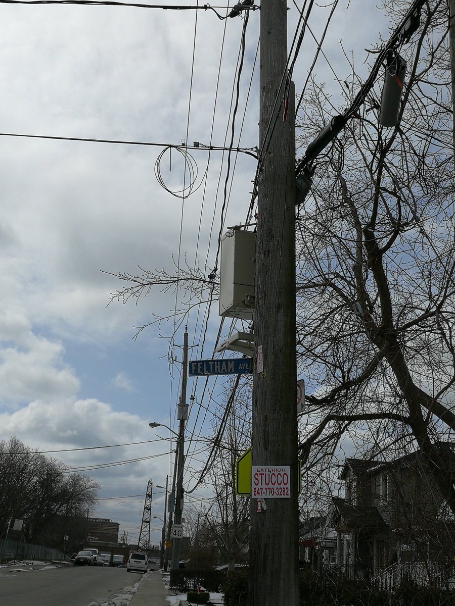 Letswalk2school's tweet photo. Hey @311Toronto - who do we need to speak to to have this old post removed? It's been blocking the school zone sign at Feltham/Spears by Harwood PS since the fall! https://t.co/liPBMCHUKX
