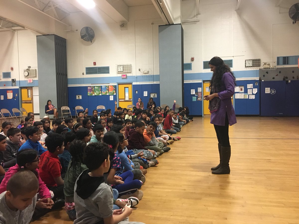 CardosoTeaches's tweet photo. I first read Save Me a Seat by @gitavarad1 and @AuthorWeeks to my students last year so they could see their culture in a book. Today we had the immense please of having @gitavarad1 visit our school! The kids were mesmerized! Thank you, Gita, for sharing your story! #mlkedison https://t.co/guIDF1AIgn