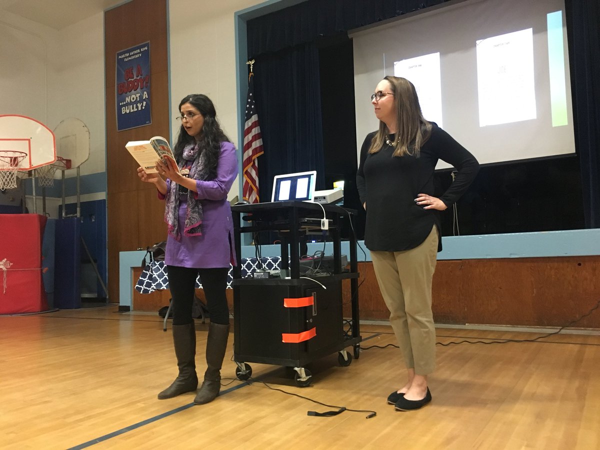 CardosoTeaches's tweet photo. I first read Save Me a Seat by @gitavarad1 and @AuthorWeeks to my students last year so they could see their culture in a book. Today we had the immense please of having @gitavarad1 visit our school! The kids were mesmerized! Thank you, Gita, for sharing your story! #mlkedison https://t.co/guIDF1AIgn