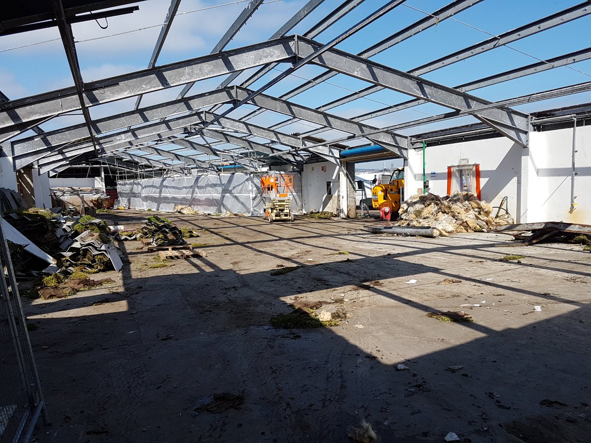 On the #WarmestDayOfTheYear it seemed only sensible to start phase 2 of the project on @NewlynHarbour by taking the roof off #tanningopportunity #vitaminD #construction #project #projectmanagement
