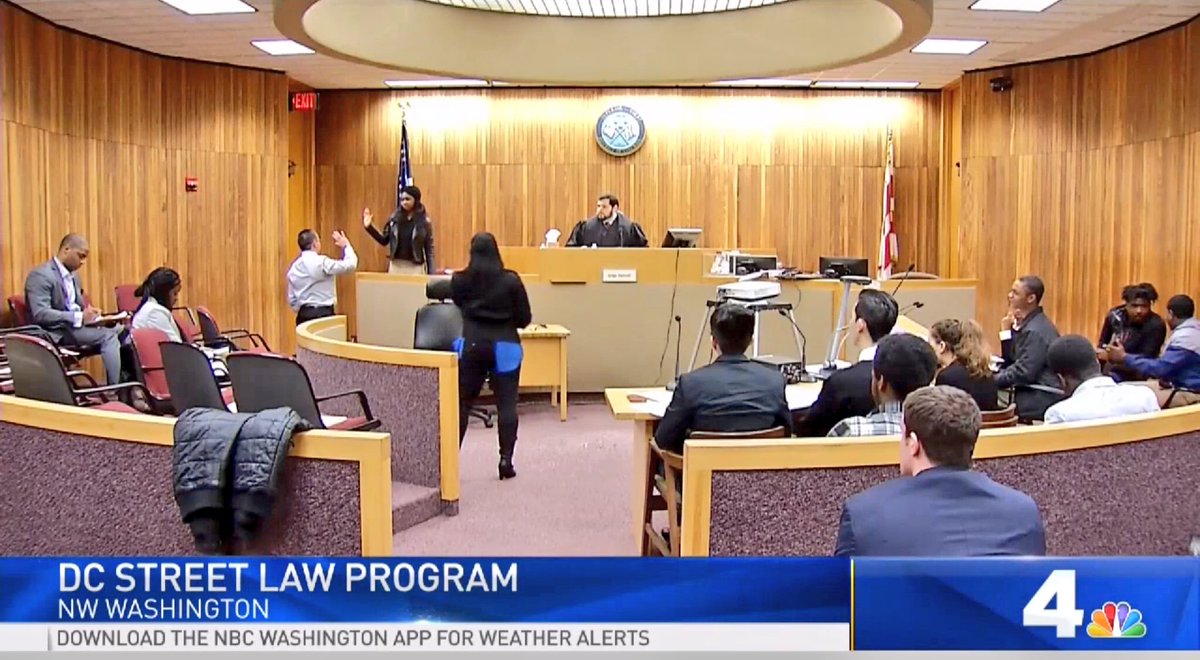 scotteabbott's tweet photo. High schoolers from @dcpublicschools compete in the citywide semifinals for the 45th annual Street Law Mock Trial competition. @GeorgetownLaw students teach a popular elective about law &amp; justice to prepare them to act as attorneys in the competition. https://t.co/WKsZMpwUml https://t.co/qnndynIFKe