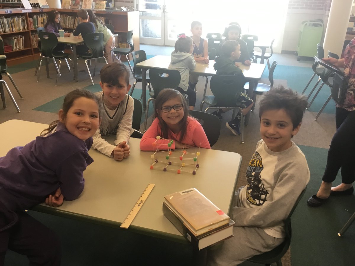 Mrs_Storz's tweet photo. Ms. Beatty's 2nd graders came to Makerspace to try their hands at engineering. They designed structures with only gumdrops and toothpicks to hold the weight of huge Harry Potter books! #HESMakerspace #HW_TILTs #GumdropChallenge https://t.co/iz07fwZ9dX