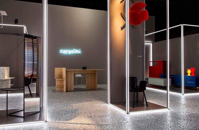 Poltronafraume's tweet photo. Cappellini @ Milan Design Week 2018: a selection of our new collection @ Rho Fiera stand in a scenery made of vivid and white neon light to emphasize the stylistic language of this project and add value to the textures used at the surface. https://t.co/u998hz789l